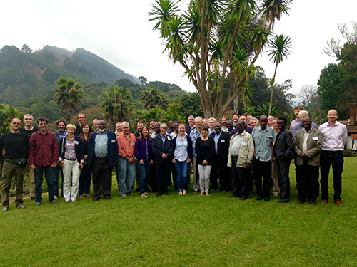 Group photo of HiTech AlkCarb workshop attendees in gardens of Sunbird Kuchawe Hotel.